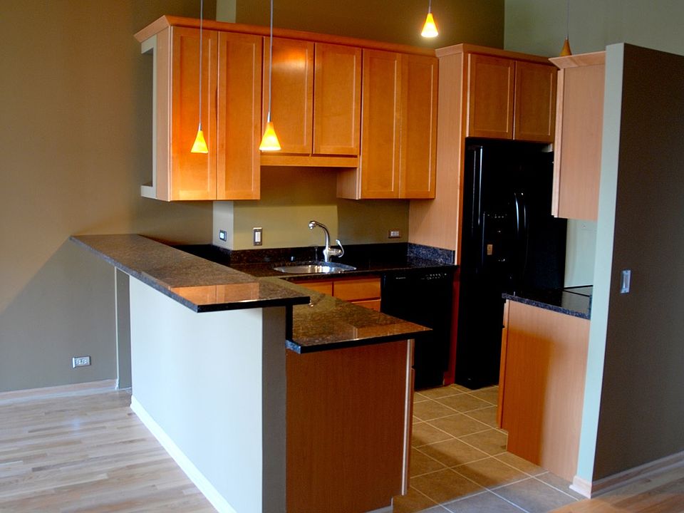 Kitchen with dishwasher and breakfast bar