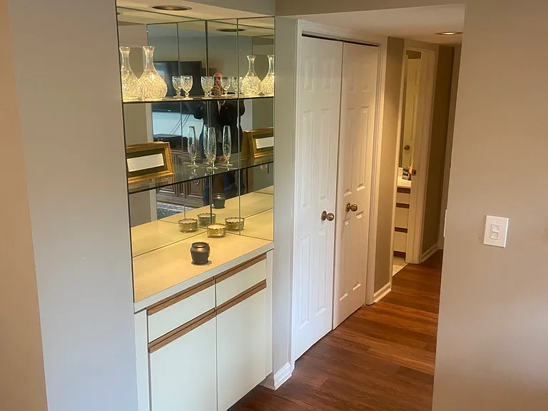 This is a view of you Bar area leading down the hall to the Batch and Mater bedroom