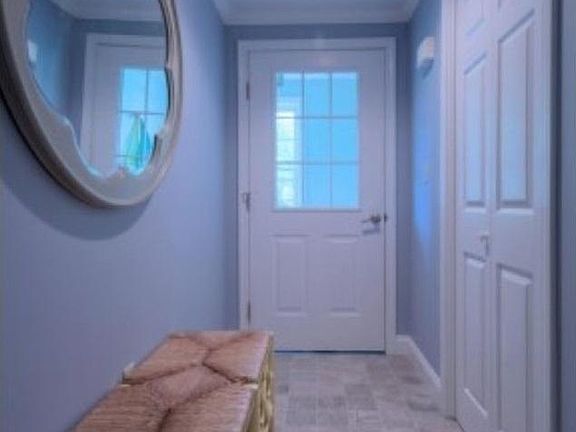 Hallway includes large coat closet