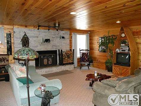 Large family room with wood burning fireplace