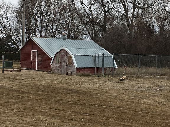 Dog kennel and storage shed