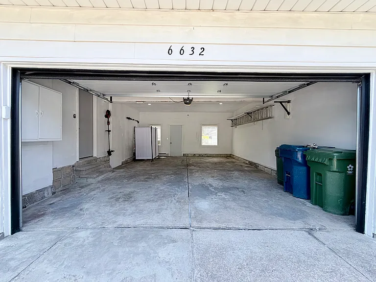 Spacious 2-car attached garage and extra-wide driveway for 4 cars.
