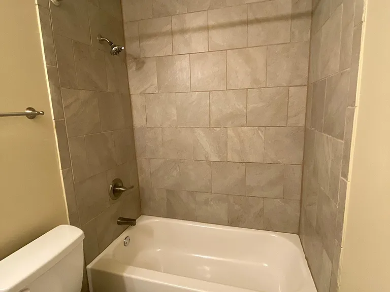 Large Bathroom with Marble Tile Large Bathroom with Marble Tile