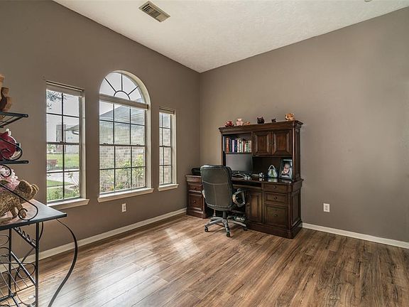 Office/Flex room off of the main entry. The room has two separate entrances and a closet if you needed a 4th bedroom.