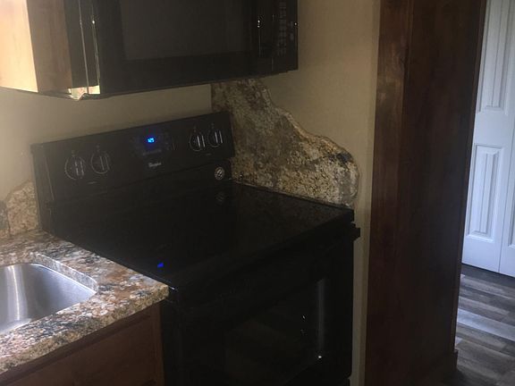4th image of 9613 W 6th Ave
