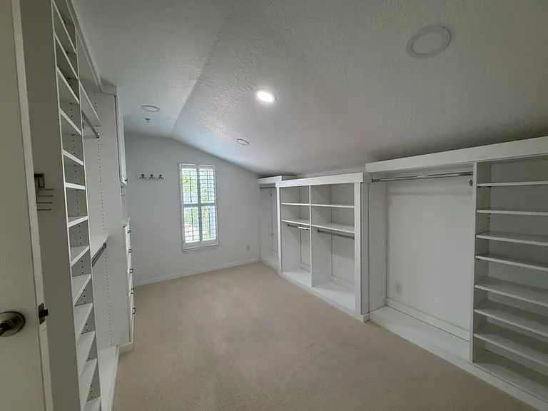 Very large primary closet with closet system
