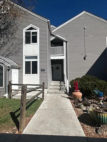 Corner unit with windows on 3 sides. Deeded carport is steps away.