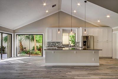 Island kitchen and dining area