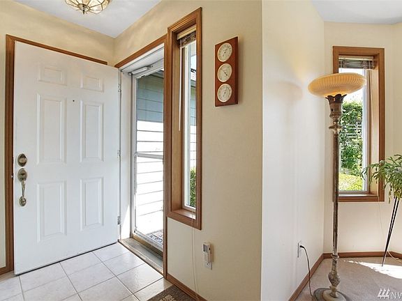 This house has heat pump, solar electric system, solar hot water system, tankless gas water heater.