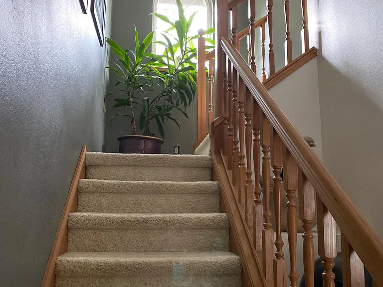 Stairs leading to bonus room/office/5th bedroom.