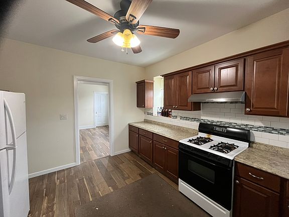 Photo is of apartment 2. Apartment 3 is being renovated with new flooring.
