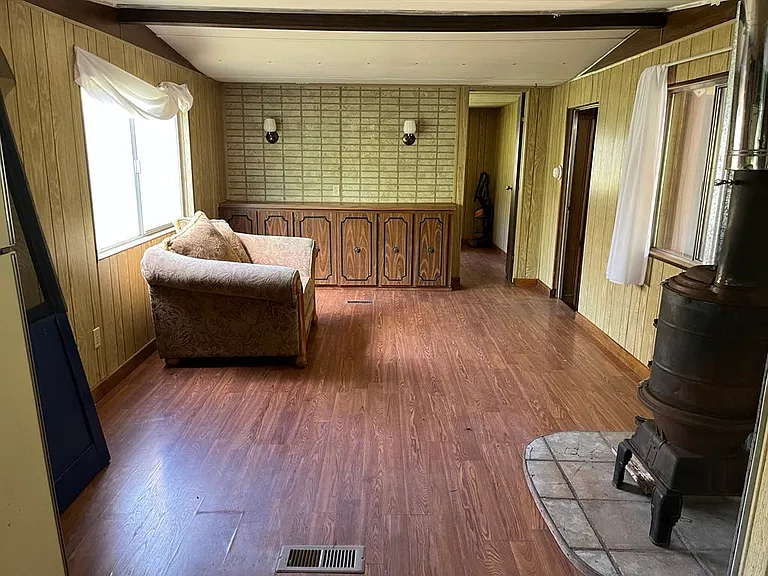 Living Room, Second Bedroom and Entryway (To Addition)