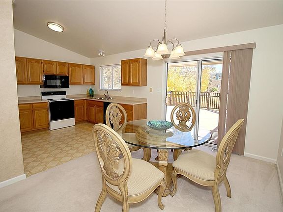 Dining Room accommodates large size table.