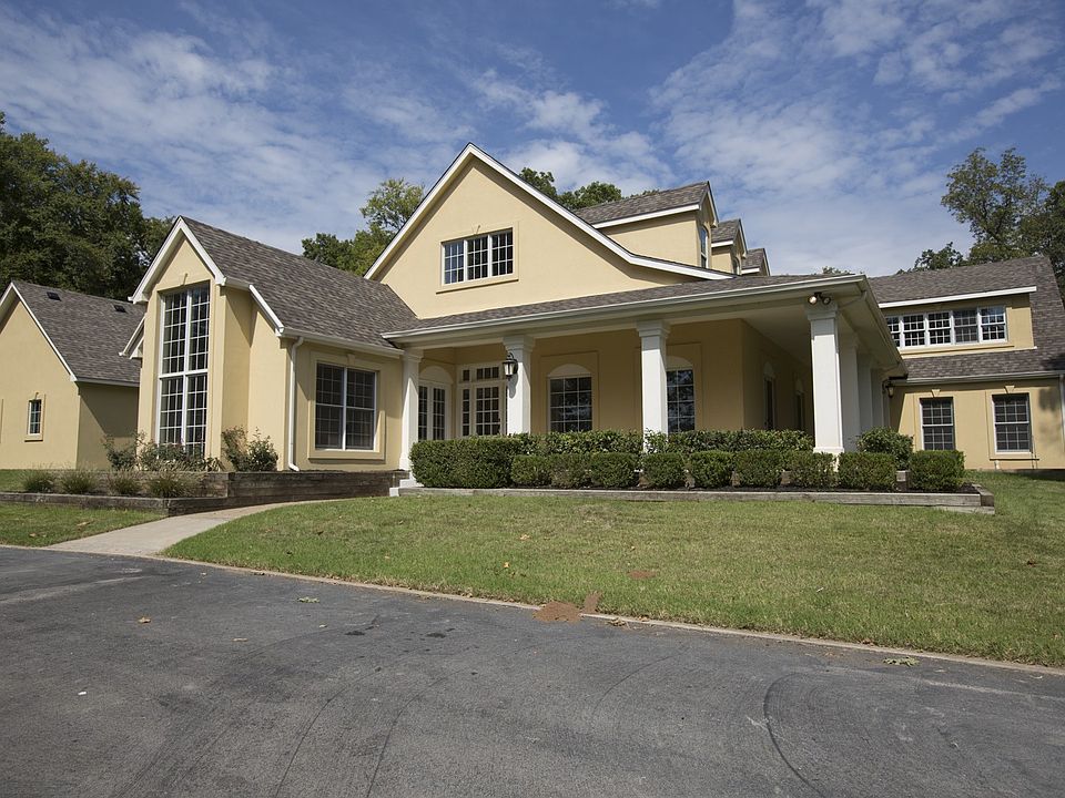 Masterfully renovated private estate with pool on wooded 5-acres in South Tulsa - Bixby Schools!