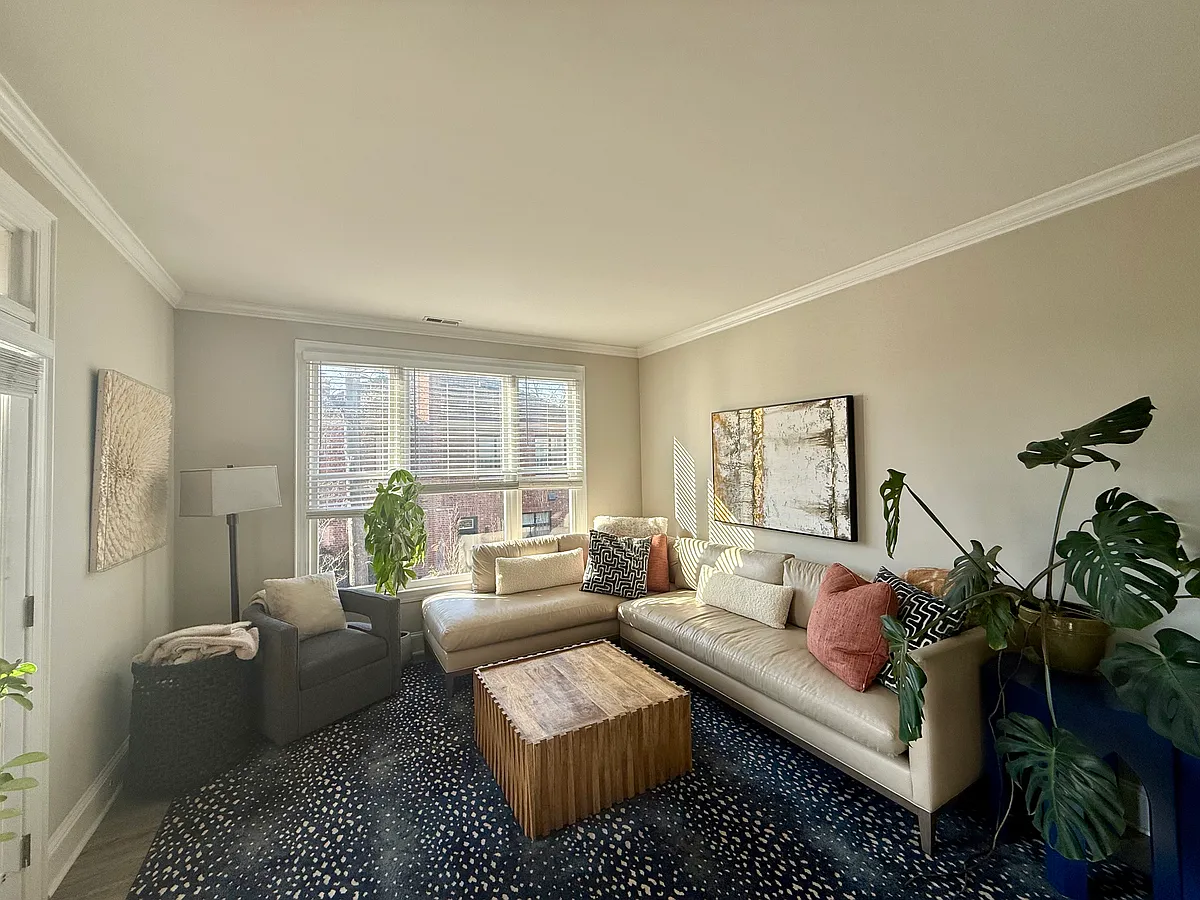 Bright and airy living room with working fireplace - 2315 Selwyn Ave #G