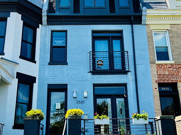 Front entrance including private patio, ring doorbell, and keypad entry