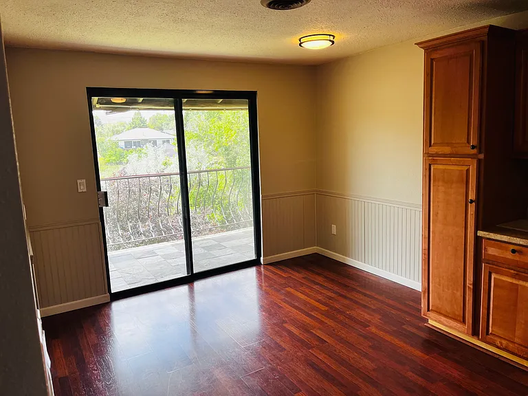 Dining and slider to balcony