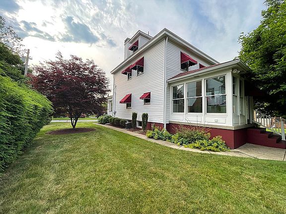 side yard and sun room