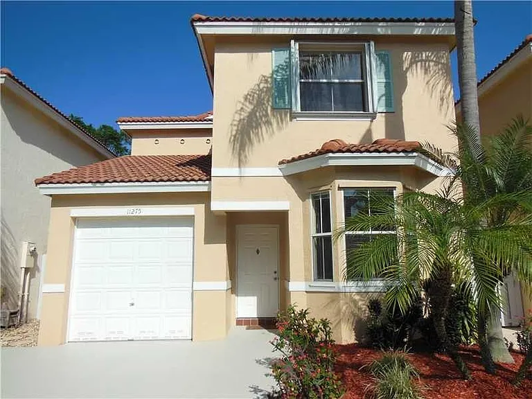 Detached single family 2 Story home with 1 Car Garage.