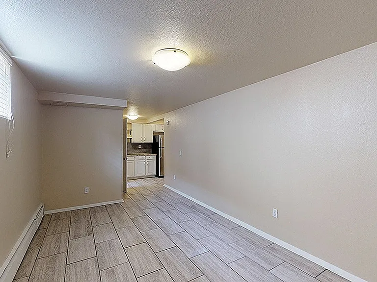 wh_elms_unit1039_543sf_living1_1200x675 wh_elms_unit1039_543sf_living1_1200x675