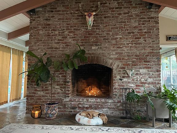 Large fireplace, all are cozy, even our fur children