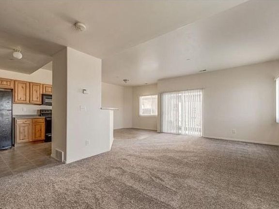 View from the front door. Open concept living (lighting has been upgraded)