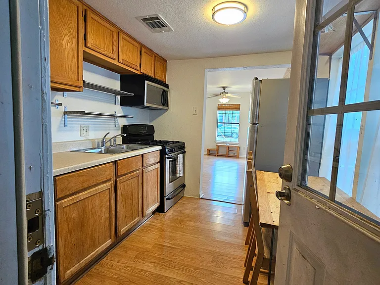 Kitchen from laundry/storage