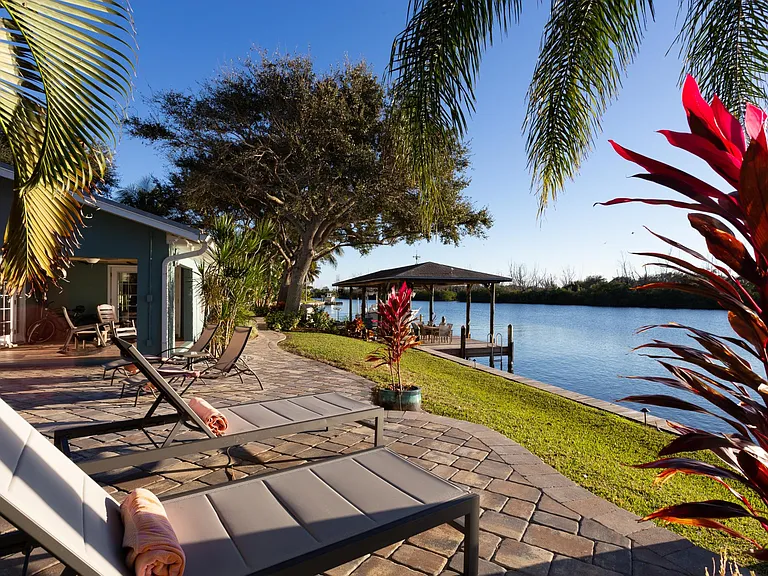 Share the backyard with dolphins and manatees
