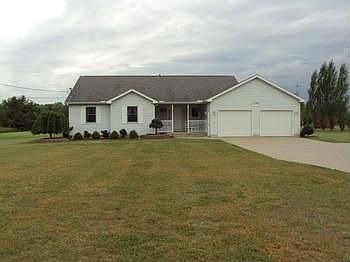 CUSTOM BUILT HOME IN 1998!! Movein condition! Nice set back from the road with 3 acres. Covered fron