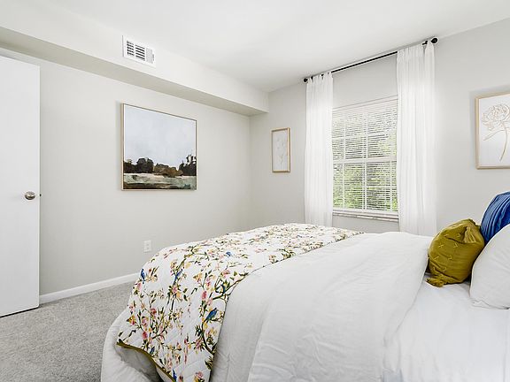 large bedroom with ample sunlight