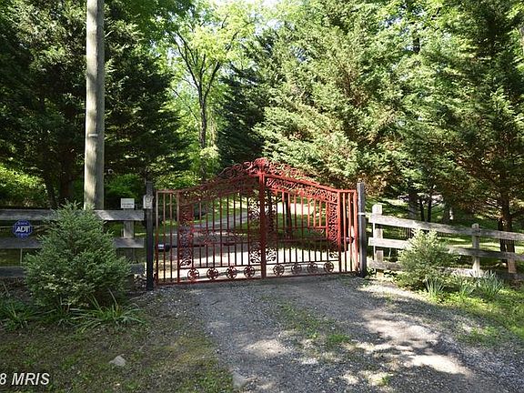 This gorgeous gated entrance welcomes you home...