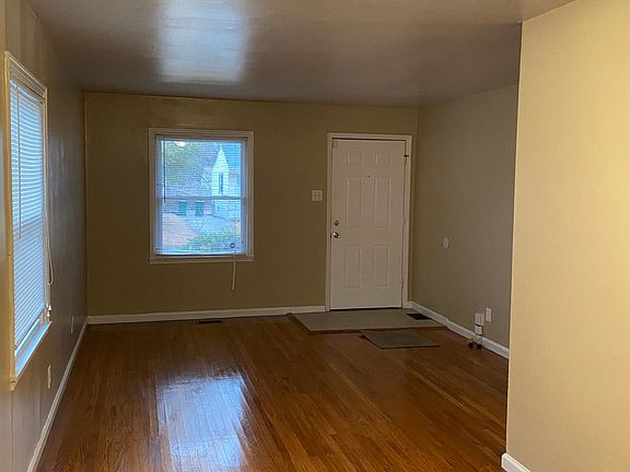 Dining room/Living room freshly re-done hardwood floors! Fresh Paint! New lighting throughout!