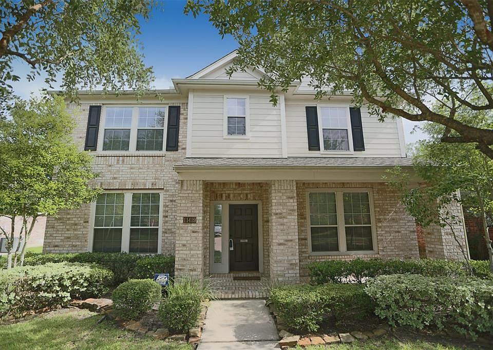 What a stately home in Lakewood Grove! Welcome friends and family to your new home on this amazing front porch.