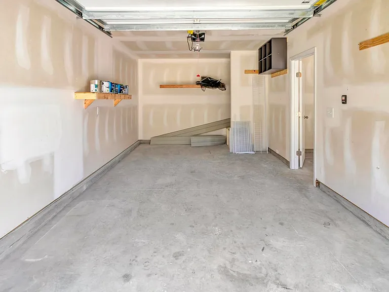 2 Separate but Attached Garages - You can Each have a Garage!
