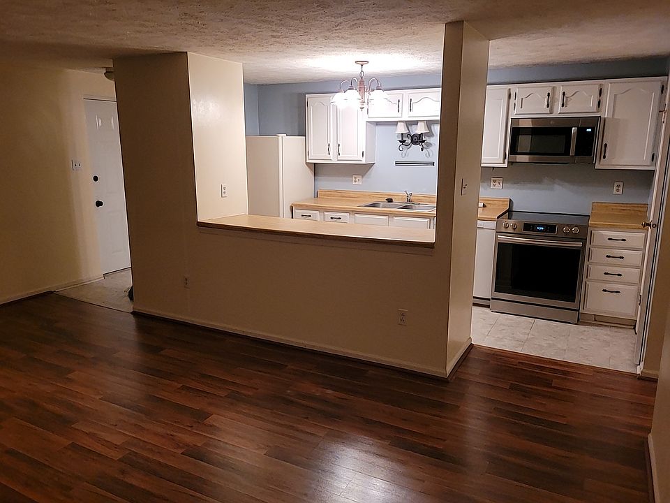 Open concept living room with kitchen bar