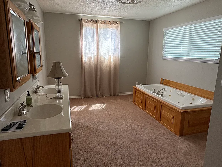 Primary Bathroom - vanity & jacuzzi bathtub