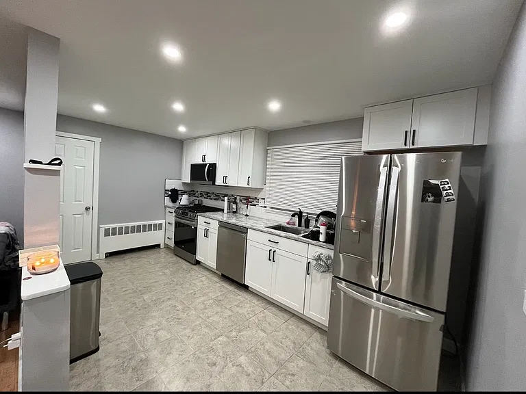 Large Kitchen (tile floor) with large pantry closet