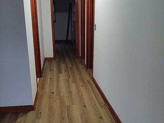 Hallway to bedrooms and bathroom