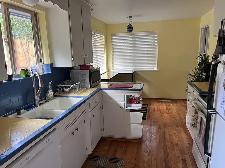 Kitchen - including dishwasher, microwave, large fridge, toaster oven, etc