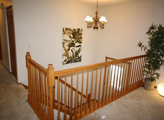 Beatiful custom railing's flowing from the top to the bottom of the stairs.