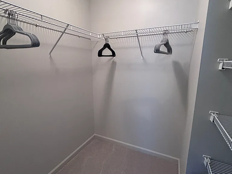 Upstairs bedroom 2 walk-in closet