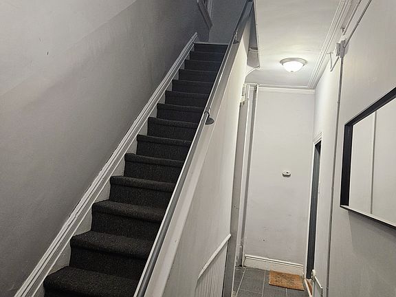 Entryway and staircase to 2nd floor