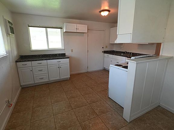 Living room/kitchen area.