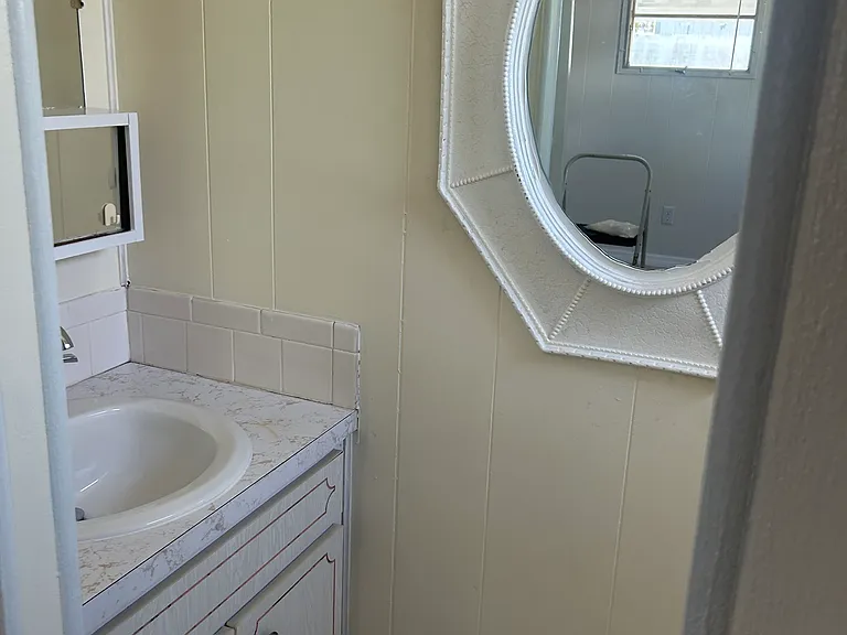 Master bedroom half bath.