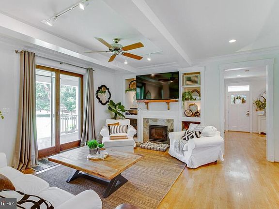 Great Room has Built-In Shelves and Fireplace