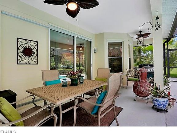 Lovely outdoor cooking and dining area next to the pool.