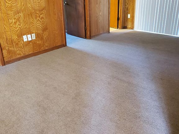 Living area. Recently installed carpet