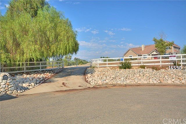 Welcome to 16590 Ginney Way, Perris in Beautiful Lake Mathews-Gavilan Hills. Gated entry for added privacy.