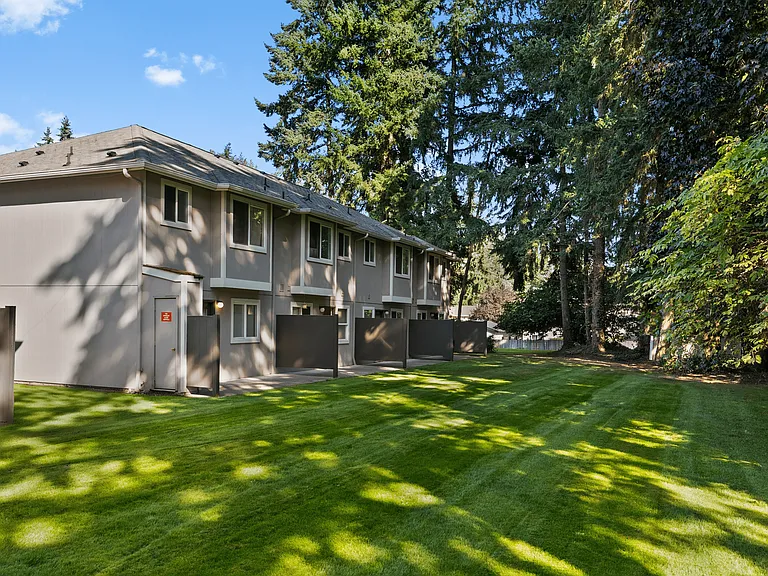 Peaceful, park-like surroundings with private patios and open green space at Mountain Park Townhomes.