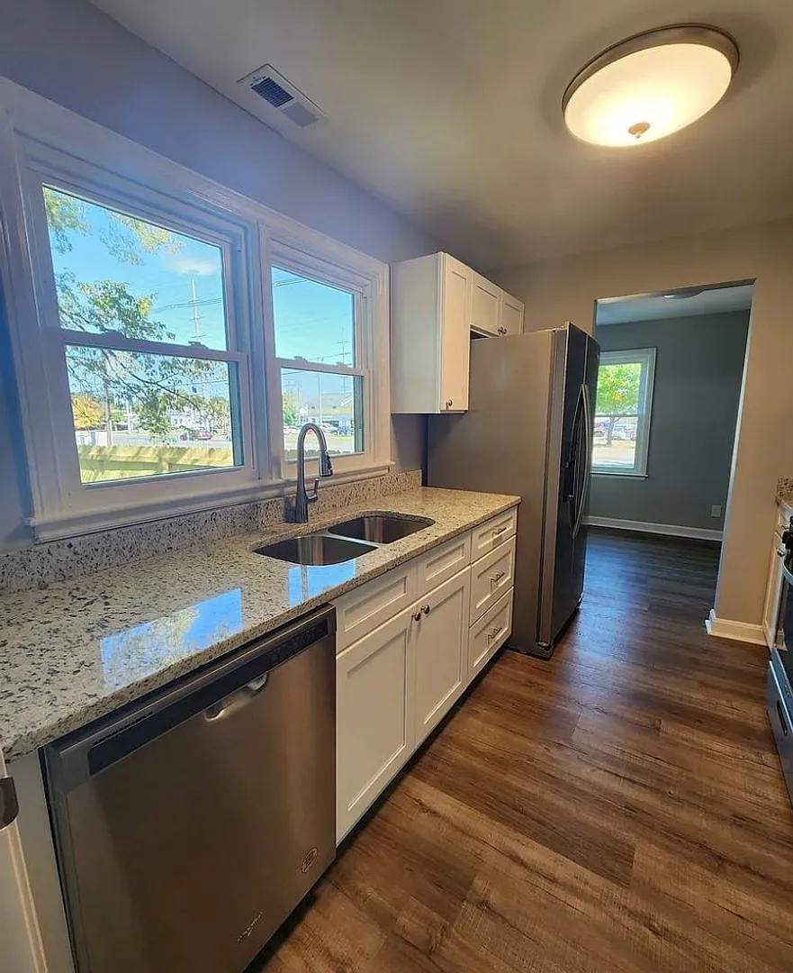 One-of-a-Kind 3 Bedroom Home with Renovated Kitchen & Spacious Yard — Photo 4